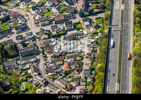 Noise barriers to the A2 motorway with residential area Mehrfamilienhäuser Dreieck in Kamen in NRW. Kamen, Ruhr area, North Rhine-Westphalia, Germany, Stock Photo