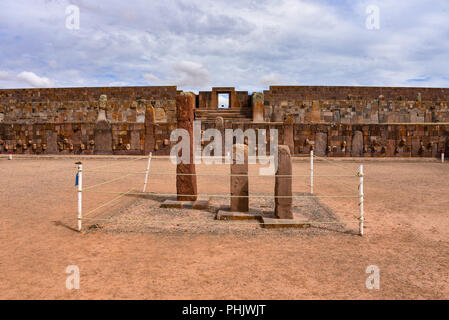 Semi-subterranean temple with the Ponce monolith visible in the Kalisasaya gateway. Tiwanaku archaeological site, La Paz, Bolivia Stock Photo