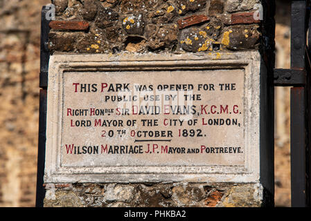 Stone carved inscription at the entrance to Castle Park, Colchester Castle, Essex. Presented by Alderman Horace Egerton Green. Opened by David Evans Stock Photo