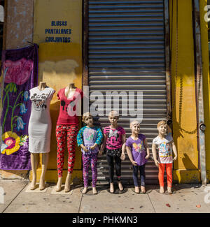 Child mannequins in the Fashion District neighborhood of Downtown Los Angeles, California. Stock Photo