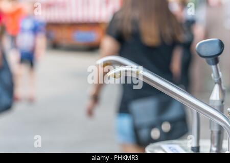 Mustard and ketchup dispenser at a folk festival, Germany Stock Photo