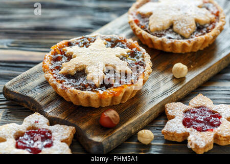 Cakes with dried fruits, orange jam and nuts. Stock Photo