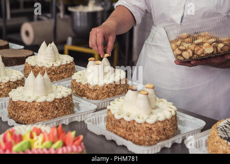 Manual cakes production Stock Photo