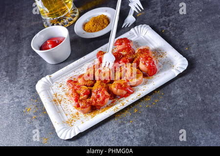 curry bockwurst with beer Stock Photo