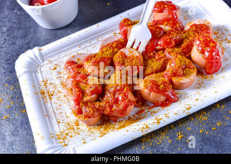 curry bockwurst with beer Stock Photo