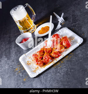 curry bockwurst with beer Stock Photo