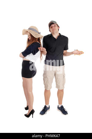 Young couple arguing, standing helpless Stock Photo