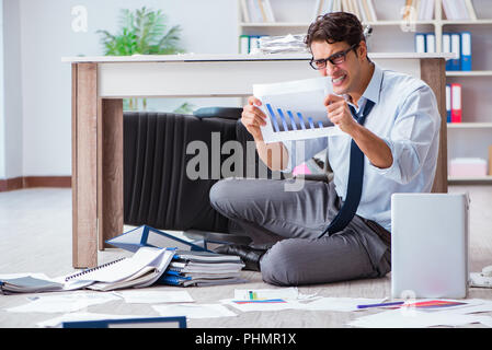 Bankrupt businessman angry in the office floor Stock Photo