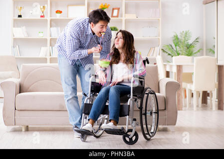 Young family taking care of each other Stock Photo