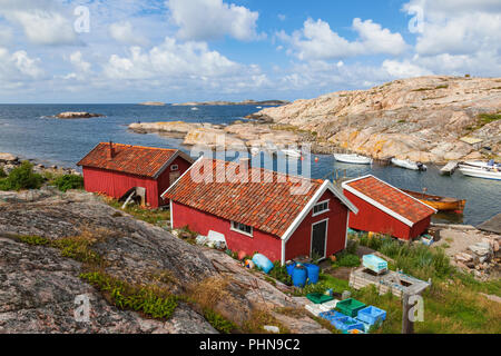 Old cottages at bay on the coast Stock Photo