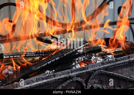 Firewood burn in the oven Stock Photo