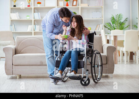 Young family taking care of each other Stock Photo