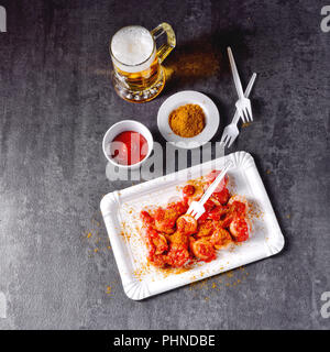 curry bockwurst with beer Stock Photo