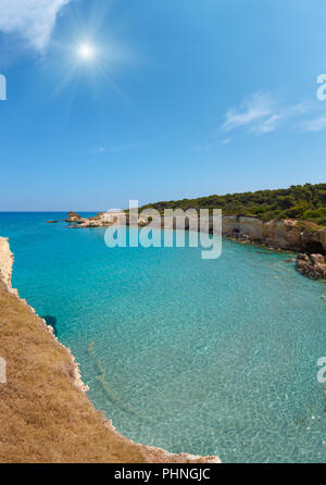 Sunshine sea beach Spiaggia della Punticeddha, Salento, Italy Stock Photo