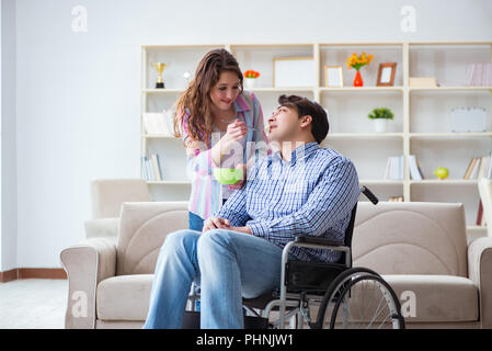 Young family taking care of each other Stock Photo