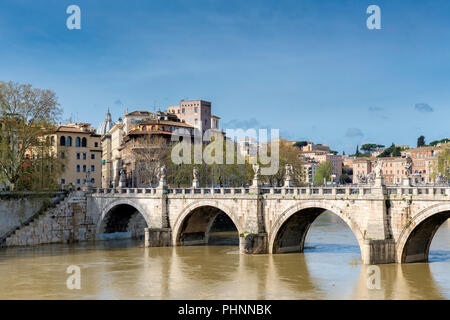 Rome downtown skyline with bridge on river Tiber at sunny day in Rome, Italy. Stock Photo