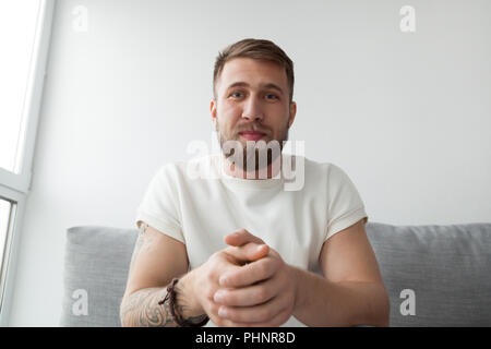 Millennial man making video call on laptop Stock Photo