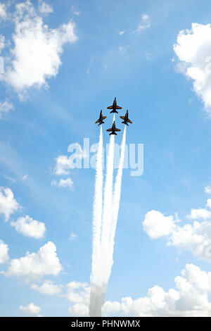 Cleveland, Ohio, USA, 1st Sept, 2018.  The U.S. Navy Blue Angels show off a formation at the 54th Annual Cleveland National Air Show, one of the premier air shows in the United States.  Founded in 1946, the Blue Angels flight demonstration squadron is the second oldest flying acrobatic team in the world.  Here they are flying over Burke Lakefront Airport for the US Labor Holiday weekend air show.  Credit: Mark Kanning/Alamy Live News. Stock Photo