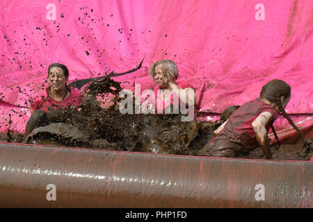 Stithians, Cornwall, UK. 2nd September 2018. Around 2000 entrants completed a 5k muddy race to raise funds for cancer research today. Seen here student nurse Emma Renshaw with fellow students. Credit: Simon Maycock/Alamy Live News Stock Photo