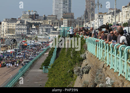 Brighton, UK. 1st September 2018: People watching the National Speed Trials that run along Madeira Drive in Brighton on 1 September 2018.   The Pier, in the central waterfront section, opened in 1899 houses amusement rides as well as food kiosks.Credit: David Mbiyu /Alamy Live News Stock Photo