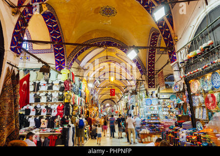 Istanbul, Turkey - August 14, 2018: People shopping inside the famous historical Grand Bazaar building on August 14, 2018 in Istanbul, Turkey. Stock Photo