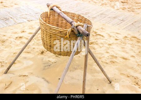 Woven Basket on Frame Sandy Beach Stock Photo