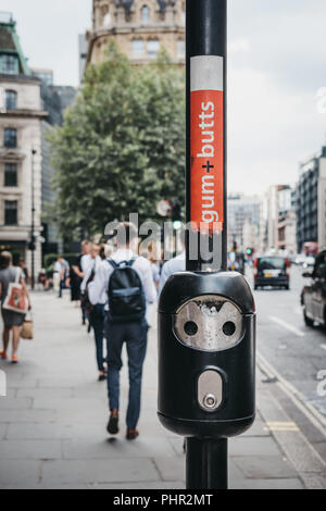 Close up of the bin for gums and cigarette butts on a lamp post in the City of London, London, UK. Stock Photo