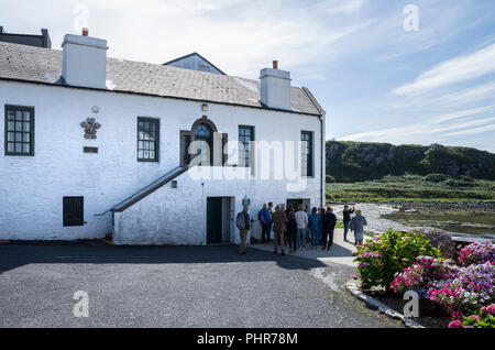 Tour group at Laphroaig Whisky Distillery on Islay, Scotland