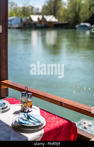 Wooden riverside restaurant in Ada Bojana Stock Photo