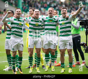 Dejected Celtic players Patrick Roberts, Scott Brown, Kieran