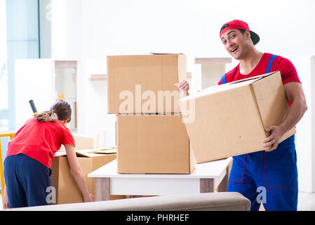 Professional movers doing home relocation Stock Photo