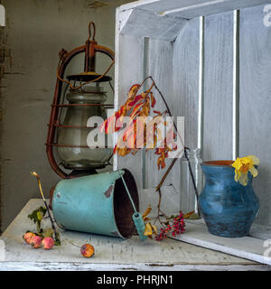 still life with boxes, dried plants and a kerosene lamp. vintage. retro. Stock Photo
