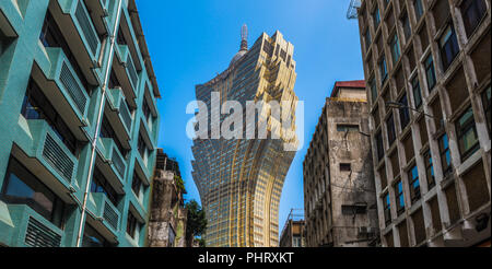 Streets of Macau. Contrast between old and modern buildings. Stock Photo