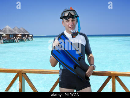 Young sports man with flippers Stock Photo