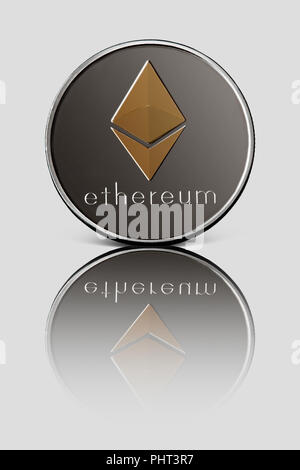 Silver coin ethereum presented on a white glossy background Stock Photo