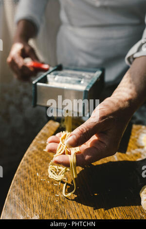 A woman making homemade pastain the traditional way Stock Photo