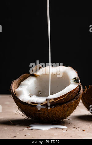 Coconut Milk Pour Stock Photo