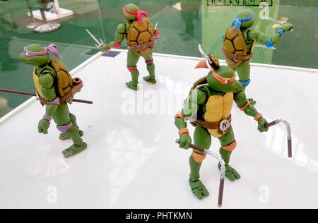 Selected focused of fictional action figure character TEENAGE MUTANT NINJA TURTLE. Displayed by collector on desk for public. Stock Photo