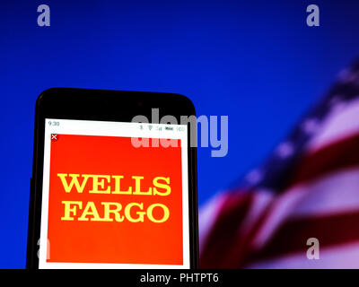 The Wells Fargo logo seen displayed on smart phone. Stock Photo