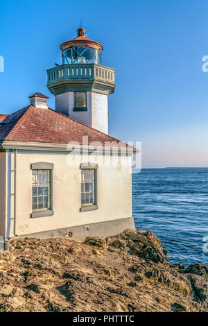 Lime Kiln Lighthouse and Orca Whale Condervancy Building on San Juan Island in Washington State, USA Stock Photo