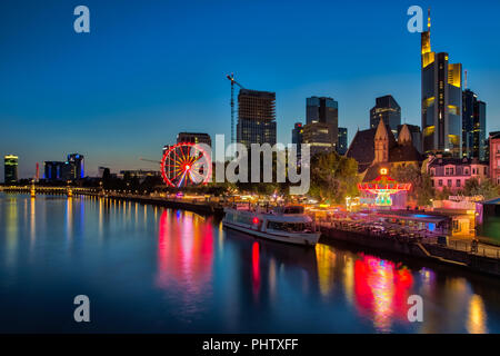 FRANKFURT AM MAIN, GERMANY - August  07, 2017: Frankfurt am Main - the business capital of Germany at night. View of illuminated skyscrapers Stock Photo