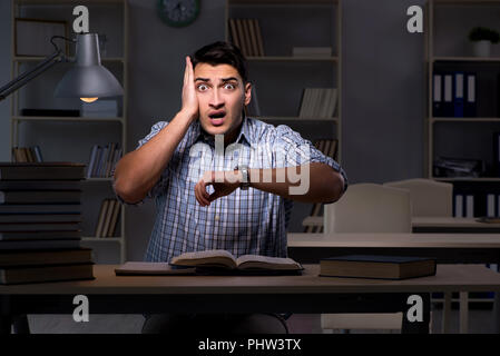 Student preparing for exams late at night Stock Photo