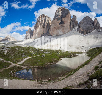 Awesome alpine lake between moraines at the foots of the Tre Cime di Lavaredo, Dolomites, Italy Stock Photo