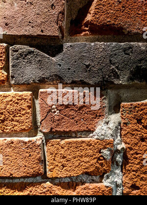 A closeup of some weathered and damaged brick masonry and mortar in Vancouver's historic Gastown neighbourhood. Stock Photo
