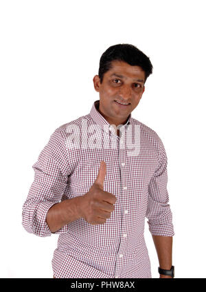 Man in his forties pointing with thump up Stock Photo