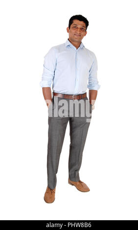 Relaxed East Indian man standing hands in pocket Stock Photo