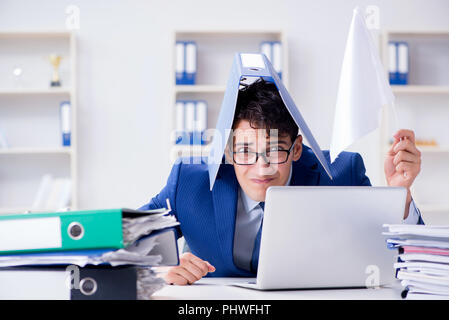 Businessman throwing white flag and giving up Stock Photo