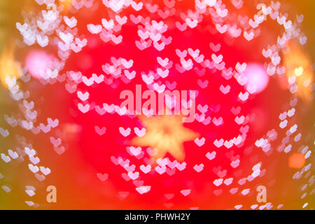 Colorful Christmas lights with a heart filter Stock Photo - Alamy