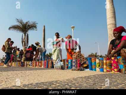 Angolan women selling wax print cloths in a street market, Luanda Province, Luanda, Angola Stock Photo