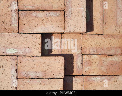 Brick stack background. Red clay bricks. Flat lay Stock Photo